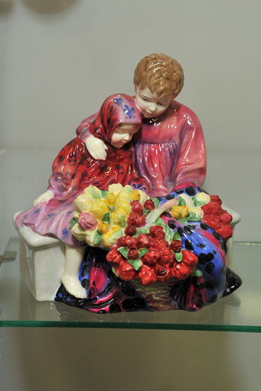 Appraisal: ROYAL DOULTON FLOWER SELLER'S CHILDREN FIGURINE Large figure group Base