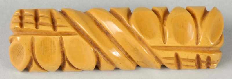 Appraisal: Bakelite Carved Butterscotch Pin Condition Excellent Size L