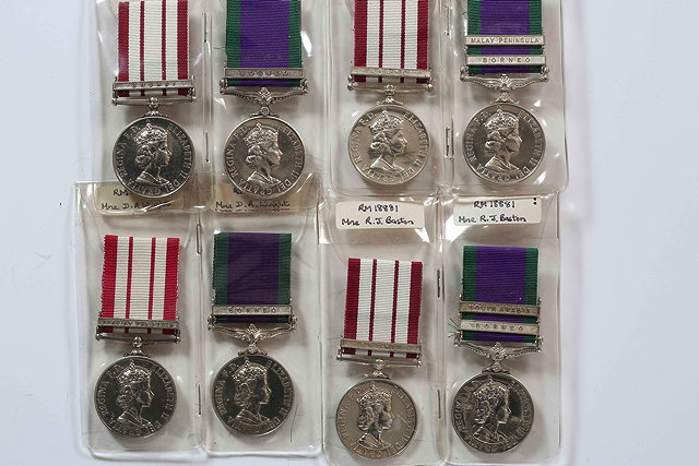 Appraisal: A PAIR OF MEDAL awarded to Marine R J Baston