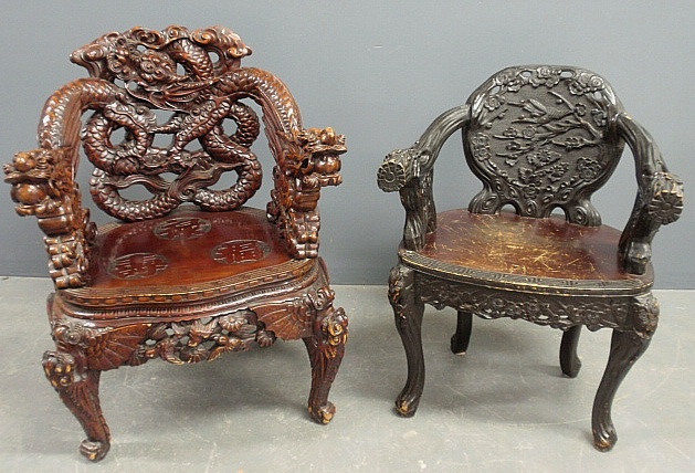 Appraisal: - Two Asian carved open armchairs th c largest h