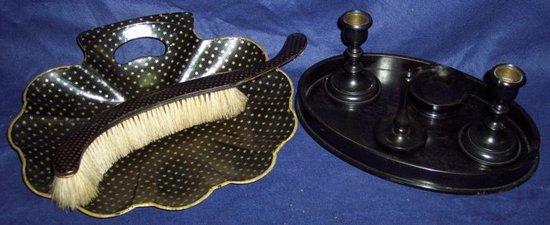 Appraisal: An ebonised five-piece dressing set a Victorian work box with