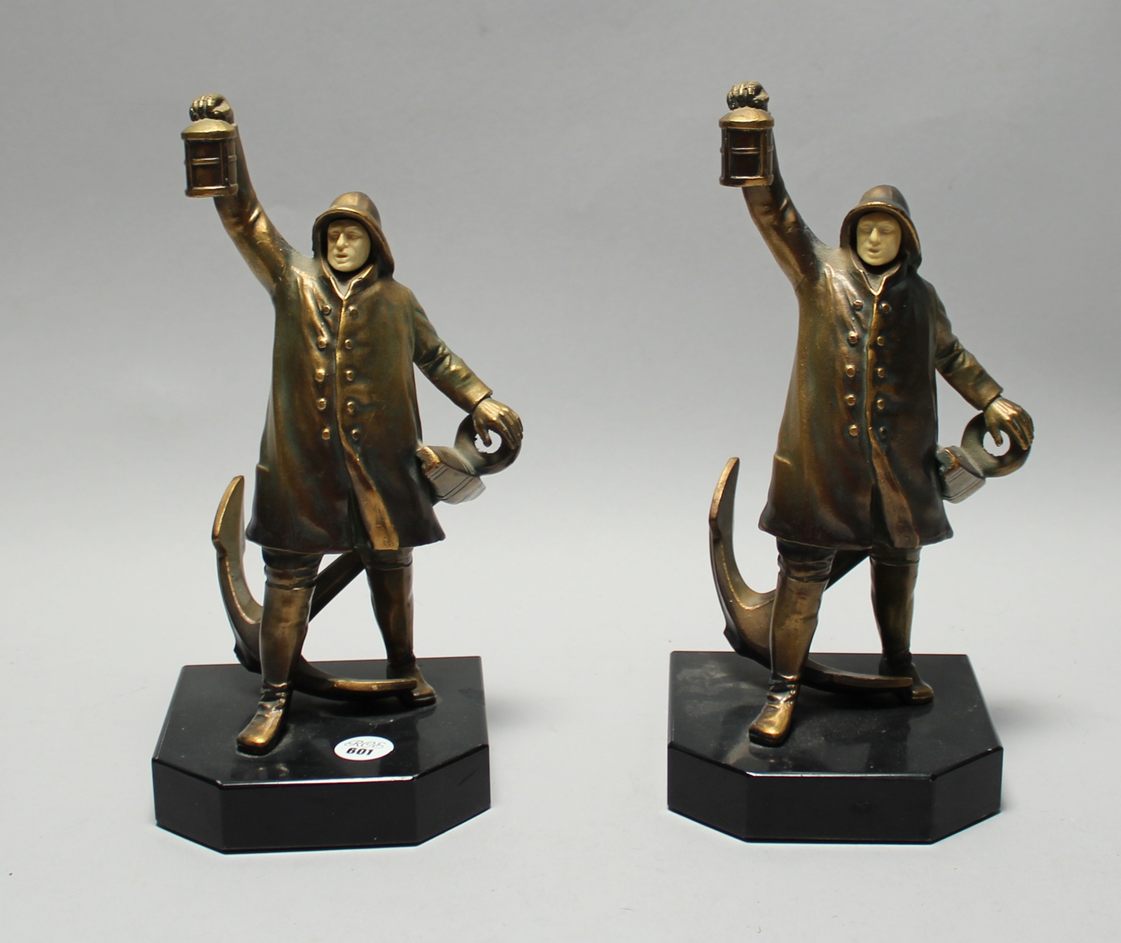 Appraisal: PAIR OF GILT METAL AND SIMULATED IVORY BOOKENDS Early th