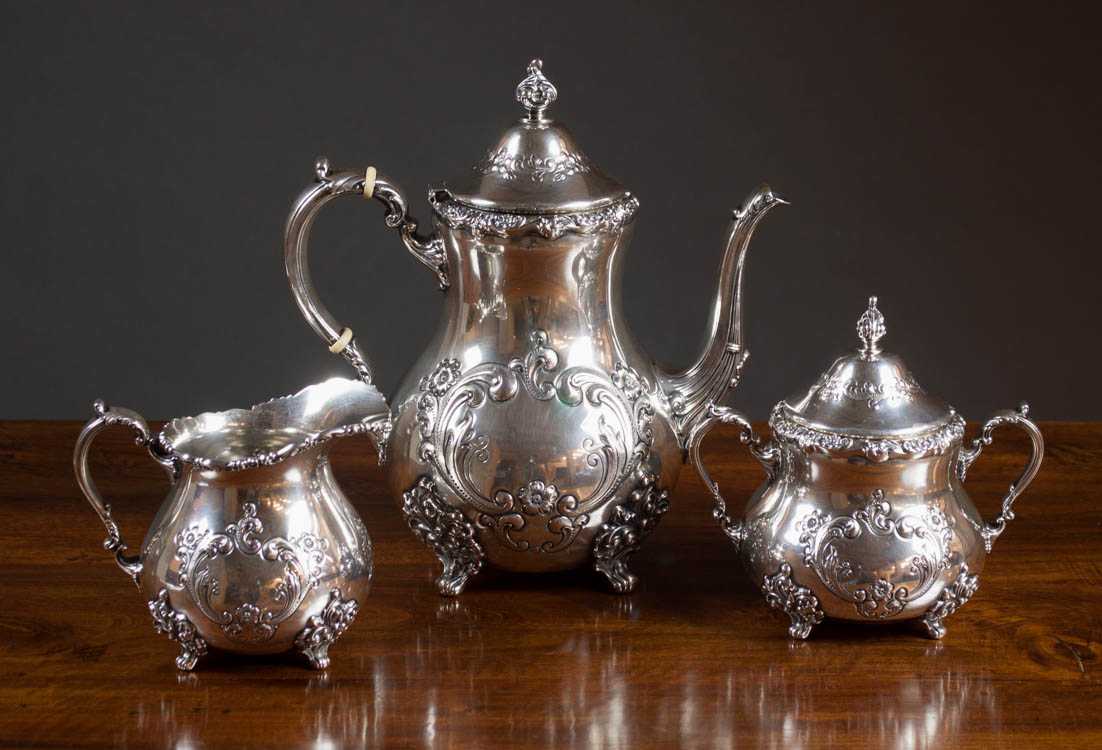 Appraisal: POOLE OLD ENGLISH STERLING SILVER TEA SERVICE three pieces comprised