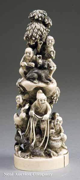 Appraisal: A Chinese Carved Ivory Figural Group modeled as a craggy