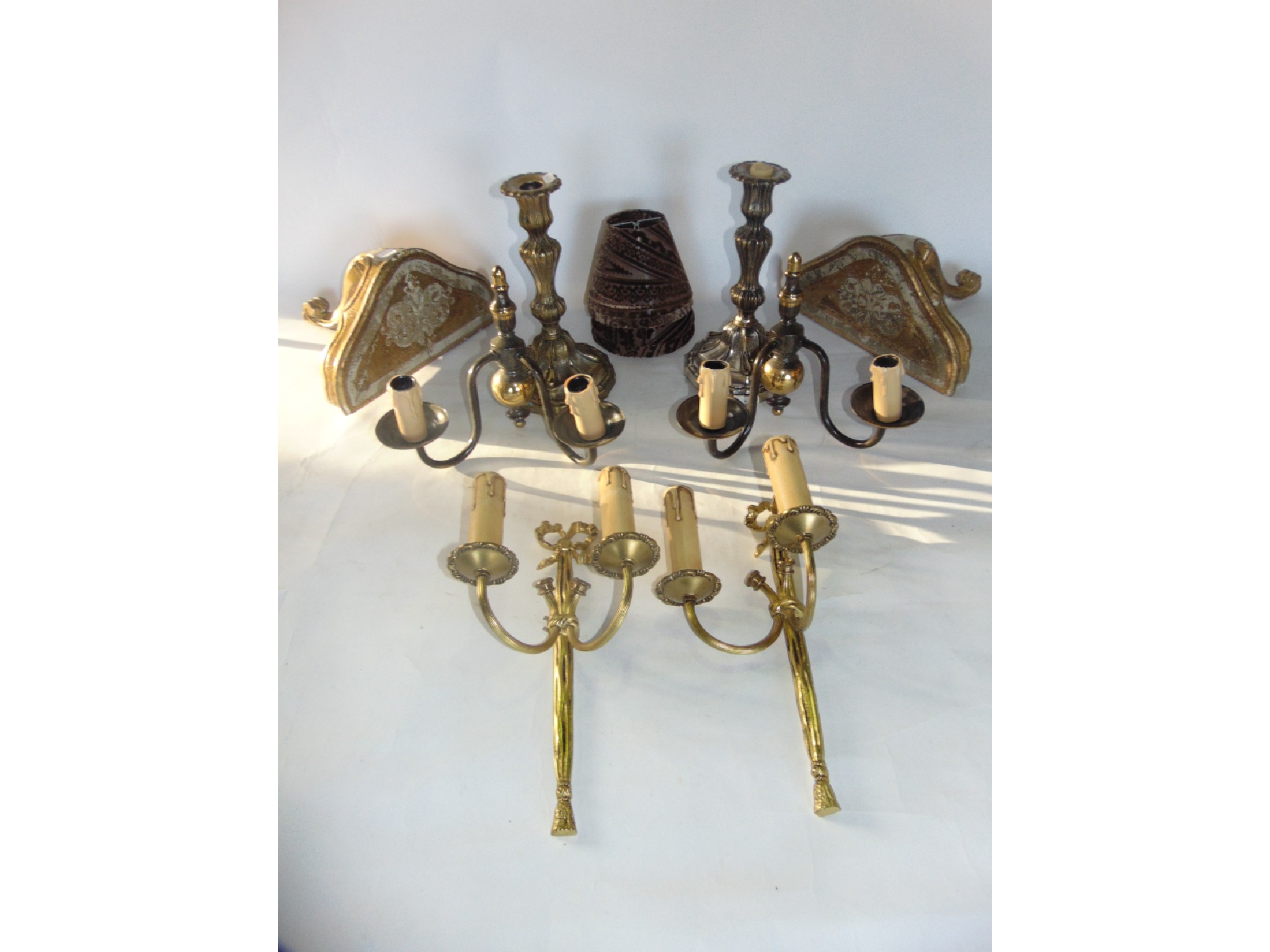 Appraisal: A pair of electronic double sconce wall lights with scrolling