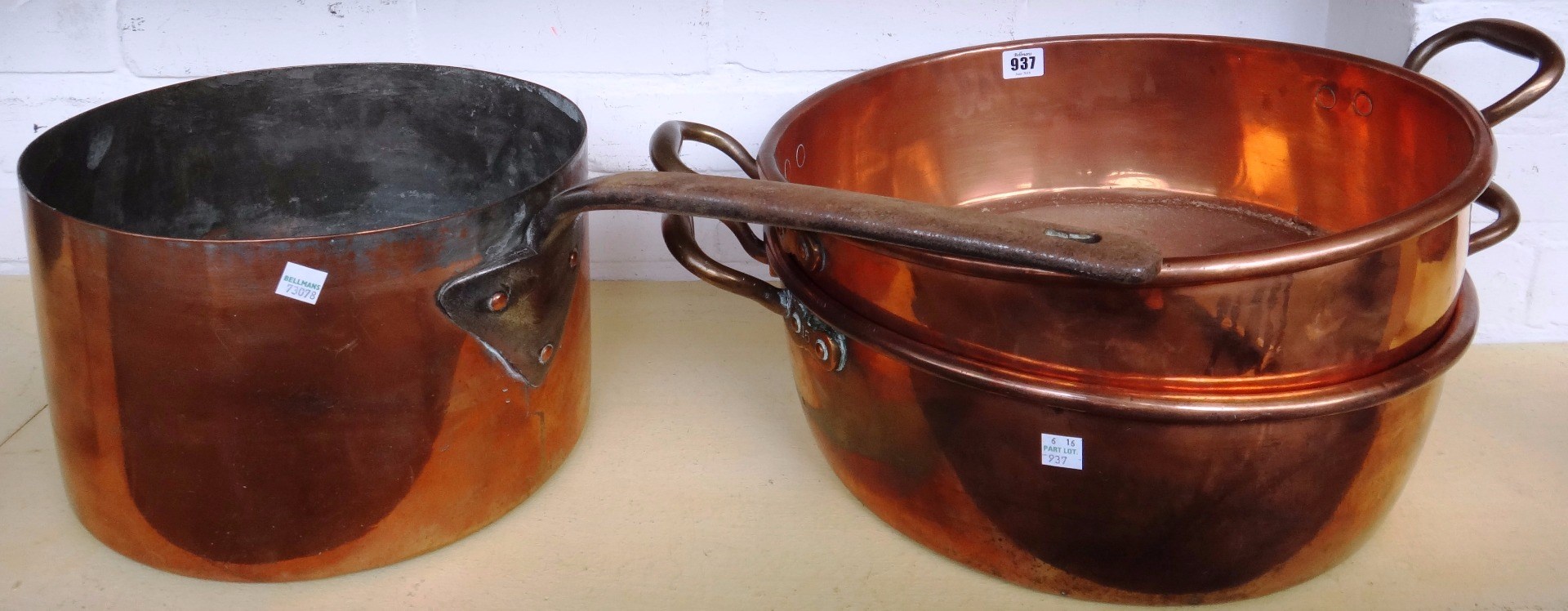 Appraisal: Two copper jam pans with brass handles cm across the