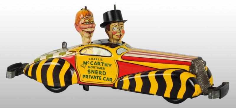 Appraisal: Tin Marx Charlie McCarthy Private Car Wind-Up Toy Description American