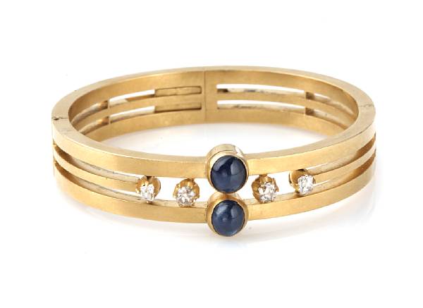 Appraisal: A sapphire diamond and gold bangle hinge broken grs gross