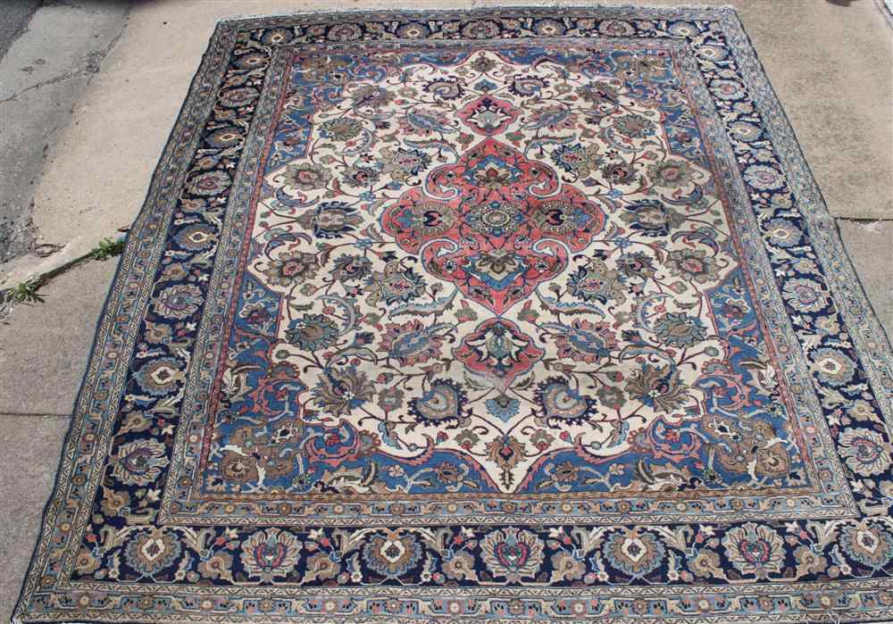 Appraisal: LARGE PERSIAN MEDALLION RUG blues cream approx x in