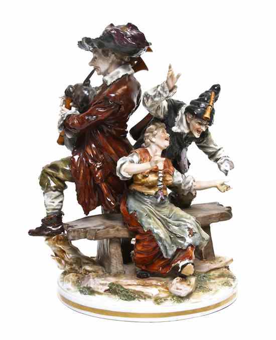 Appraisal: A Capodimonte Porcelain Figural Group depicting three vagrant musicians having