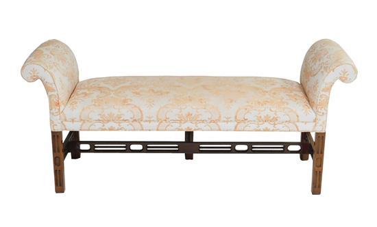 Appraisal: Chippendale style upholstered bench rolled arms two carved and pierced