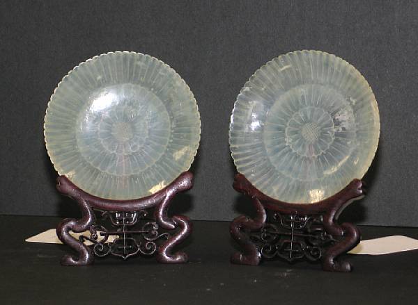 Appraisal: A pair of translucent hardstone chrysanthemum-form saucer dishes Each smoothly