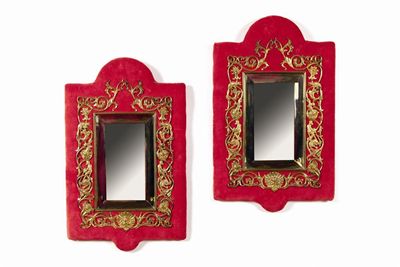 Appraisal: A pair of wall mirrors with rectangular bevelled plates set