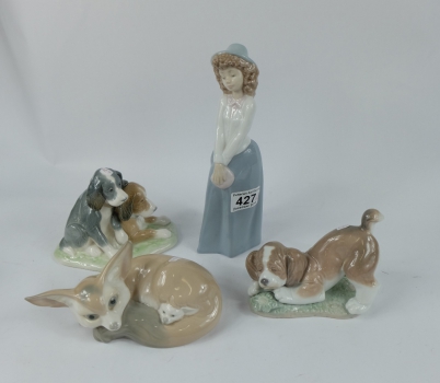 Appraisal: A collection of figures to include Nao Two Pups Lladro