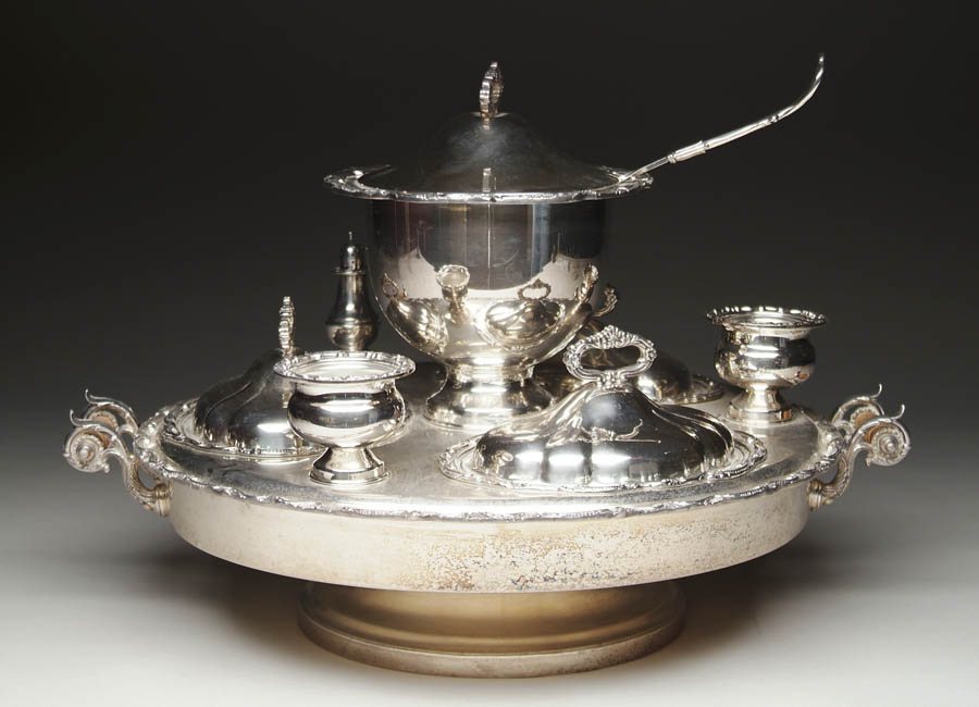 Appraisal: FINE SILVER PLATED SERVICE STATION The fitted lazy-Susan silver plated