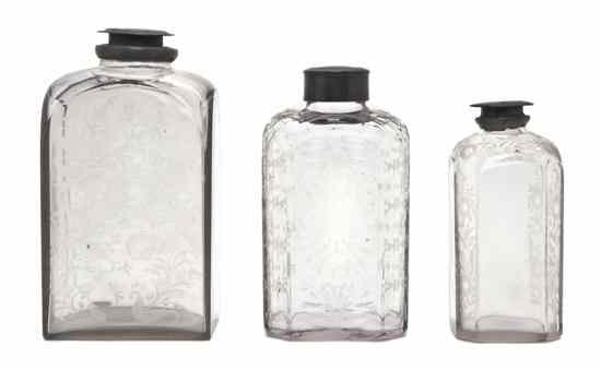 Appraisal: An Assembled Set of Three Glass Canisters each having pewter