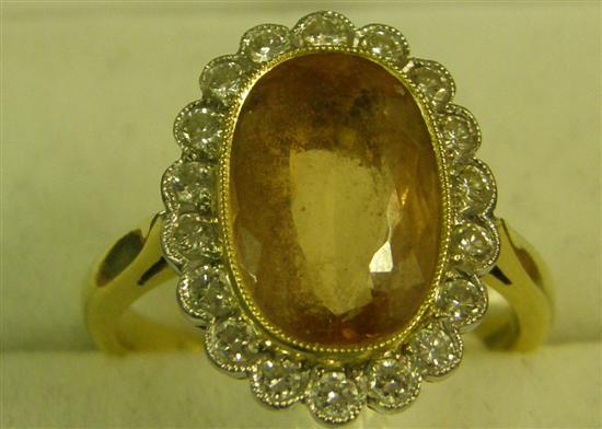 Appraisal: A DIAMOND AND CITRINE SET CLUSTER RING ct