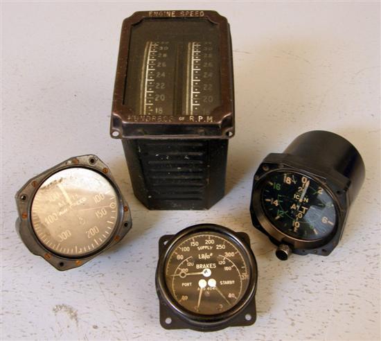 Appraisal: Four World War II Aircraft cockpit instruments engine speed gauge