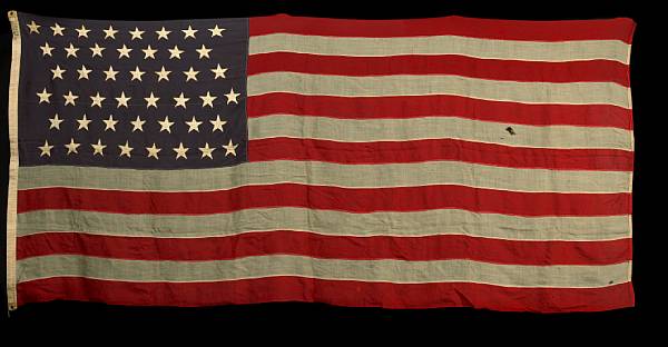 Appraisal: An American fourty-four star flag stencil marked x STANDARD height