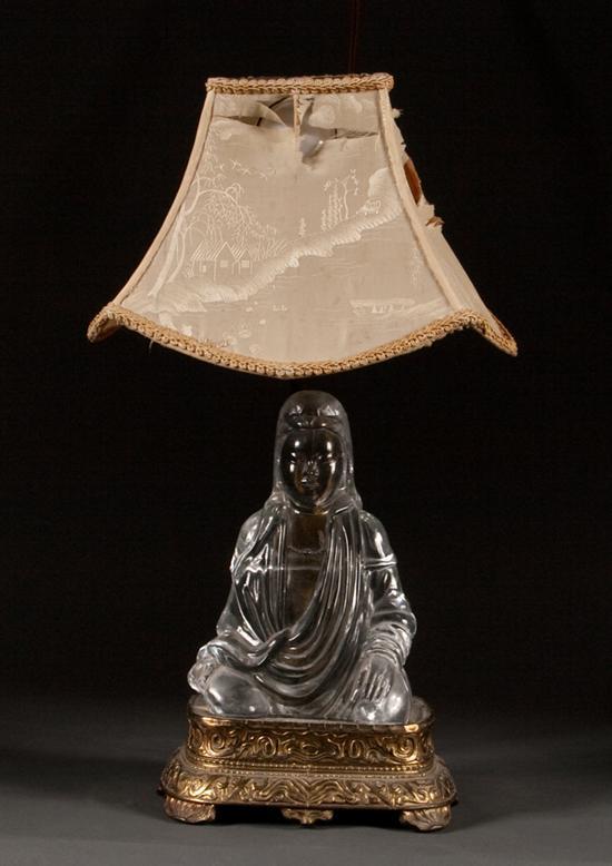 Appraisal: Oriental carved rock crystal Buddha figure mounted as a lamp