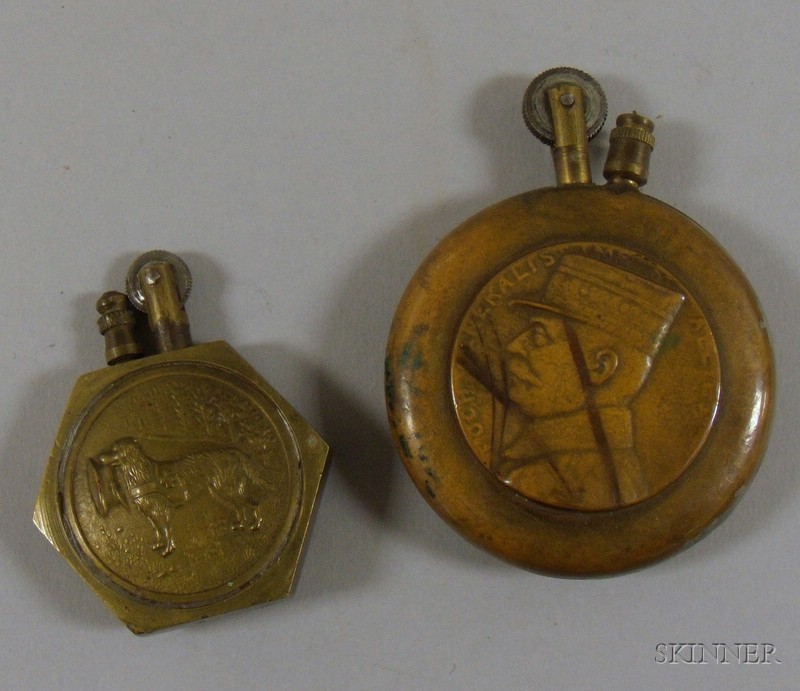 Appraisal: Two WWI Cigarette Lighters a pressed copper with Le Tigre