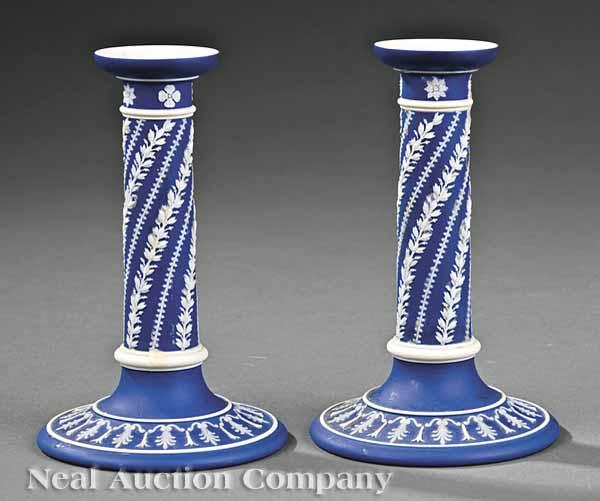 Appraisal: A Pair of Wedgwood Jasperware Candlesticks cobalt ground with Classical