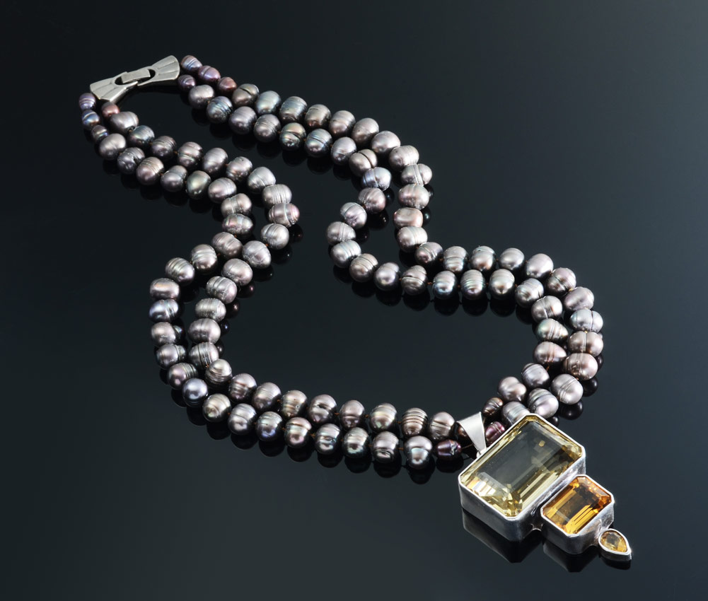 Appraisal: CHARLES ALBERT CTW CITRINE BLACK PEARL NECKLACE The sterling enhancer