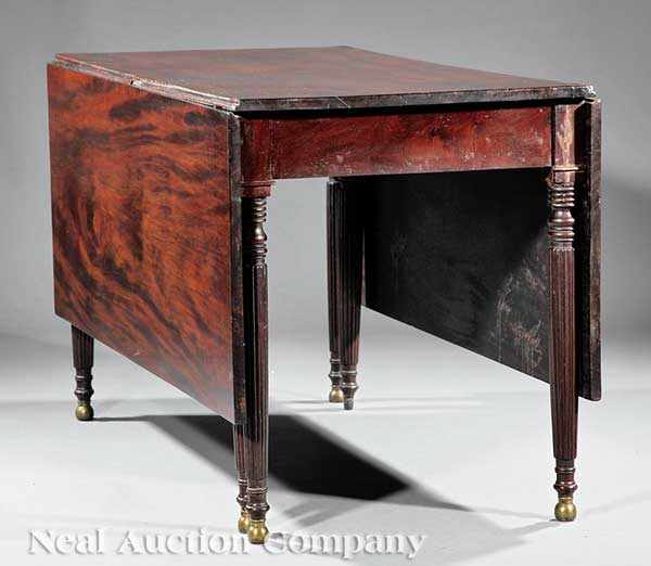 Appraisal: A West Indies Carved Mahogany Drop-Leaf Dining Table c Santo