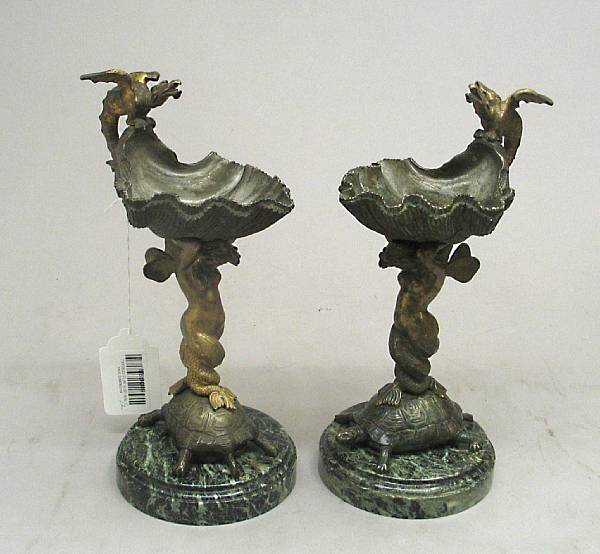 Appraisal: A pair of French gilt patinated and silvered bronze and