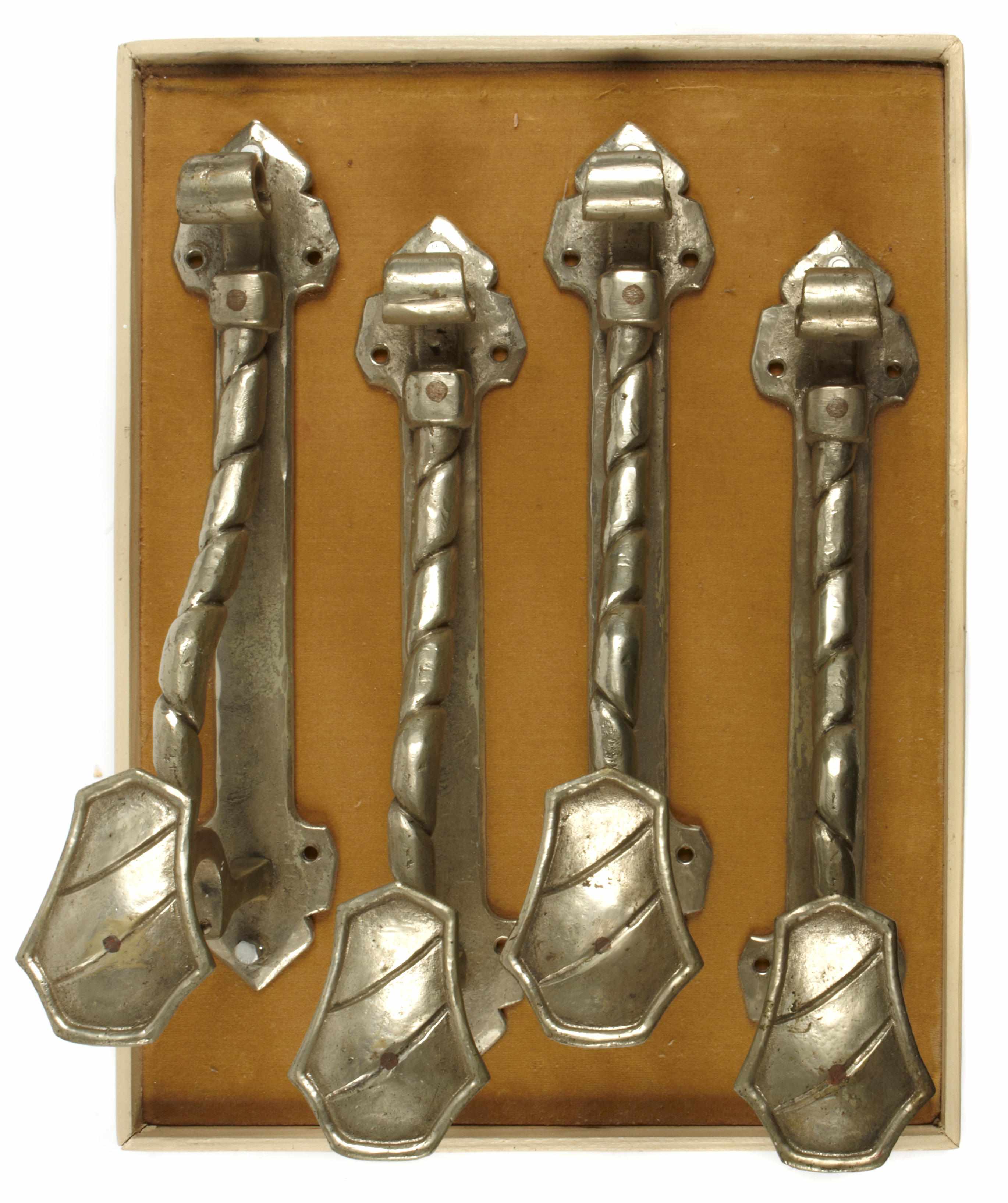 Appraisal: A group of four Renaissance Revival silvered bronze curtain tie