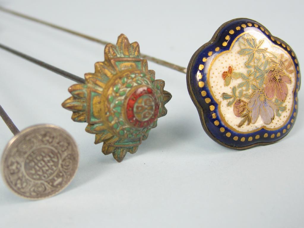 Appraisal: A steel Hatpin with satsuma finial in