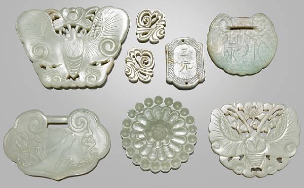 Appraisal: A group of eight jade and hardstone plaques The first