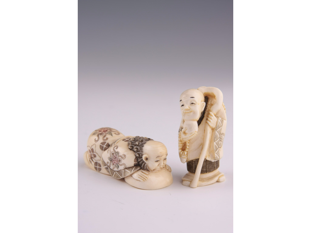 Appraisal: Two Men Netsuke Carved From Ivory th c the first