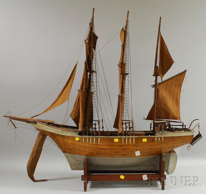 Appraisal: Wooden Three-masted Sailing Ship Model approx ht lg in