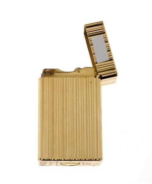 Appraisal: LIGHTER DUPONT Gold-plated Classic tall rectangular gas lighter with lengthwise