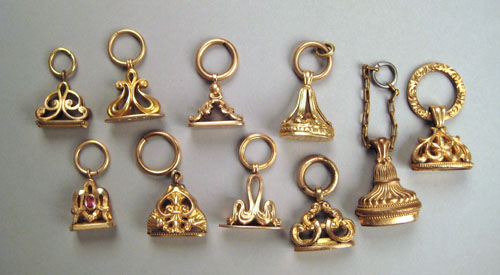 Appraisal: Ten gold and gold filled watch fobs nine with intitials