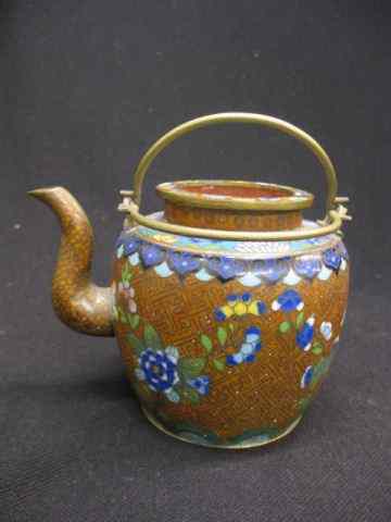 Appraisal: Oriental Cloisonne Teapot floral on brown field swing handles ''