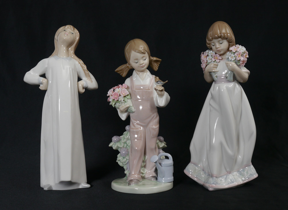 Appraisal: LLADRO PORCELAIN FIGURINES Girl Stretching Fulgencio Garcia sculptor issued retired