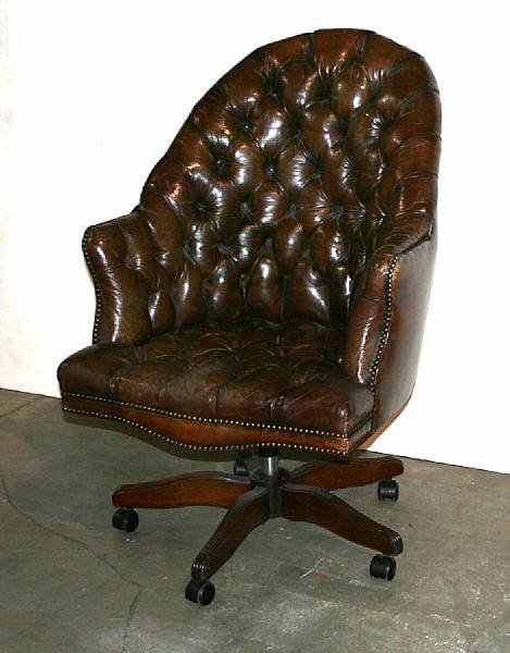 Appraisal: A Victorian style tufted leather swiveling office chair th century