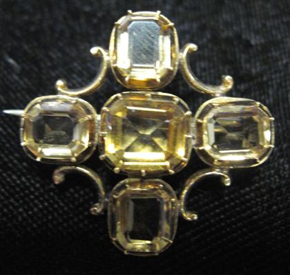 Appraisal: Low karat yellow gold and citrine broochFive pinch set emerald