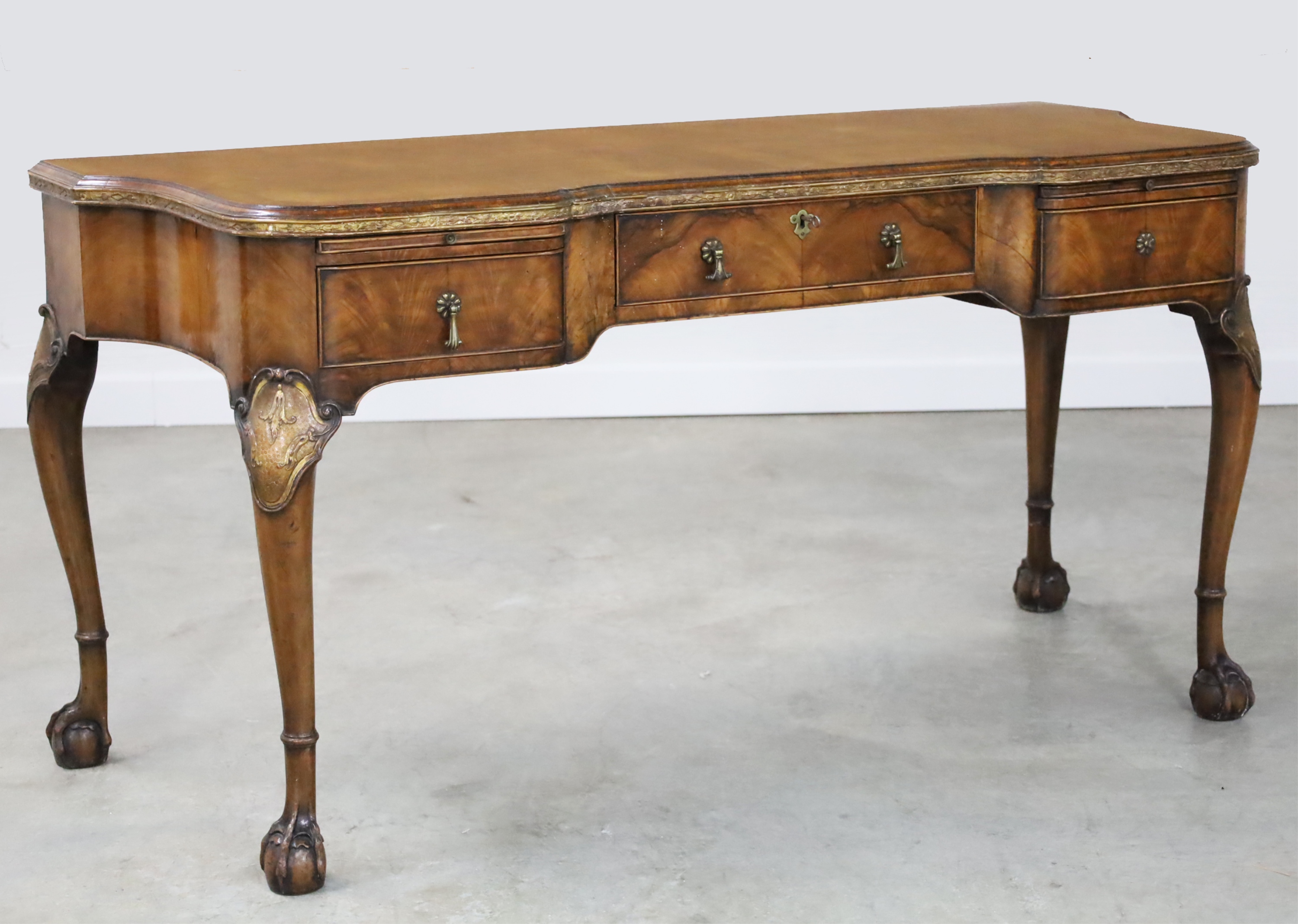 Appraisal: GEORGIAN STYLE WALNUT WRITING TABLE Handsome Georgian style shaped front