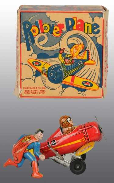 Appraisal: Tin Marx Superman Rollover Plane Wind-Up Toy Description American Working