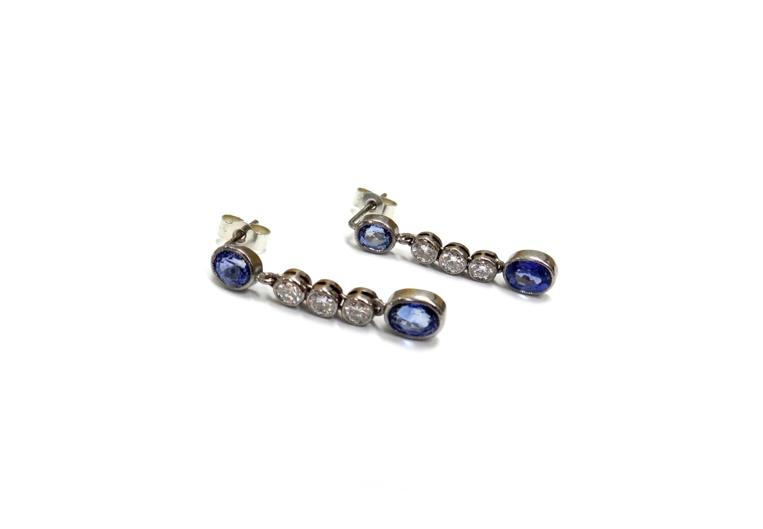 Appraisal: A pair of sapphire and diamond pendent earrings each with