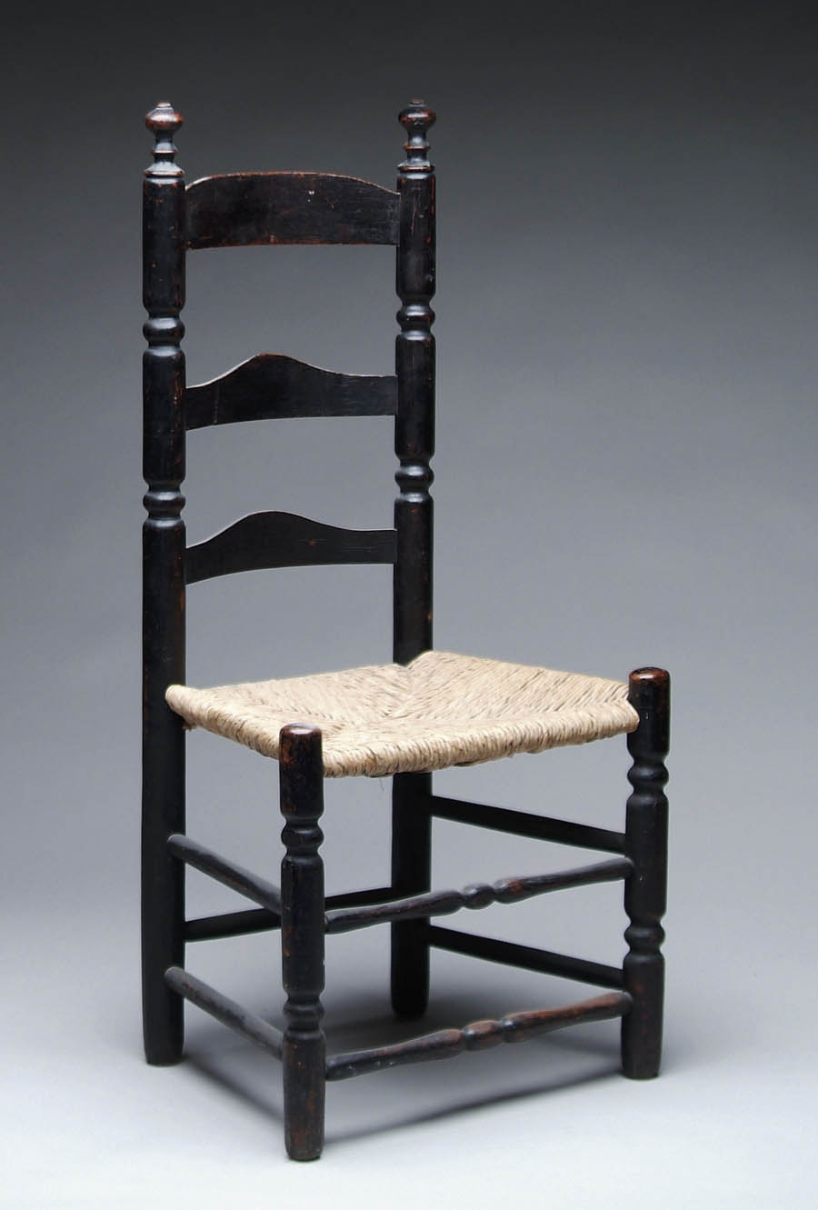 Appraisal: EARLY LADDER-BACK SIDE CHAIR Sausage and ring turned posts and