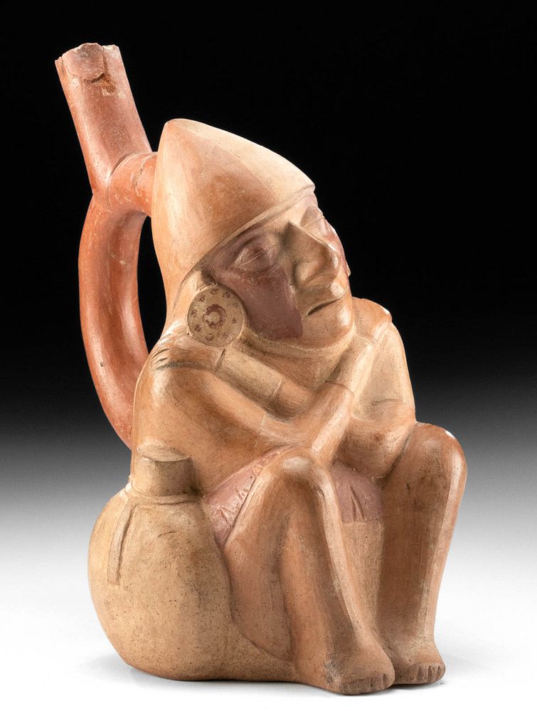 Appraisal: Moche Polychrome Stirrup Vessel of a Seated Warrior Pre-Columbian North