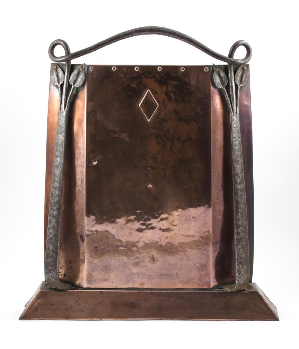 Appraisal: A copper and wrought iron fire screen