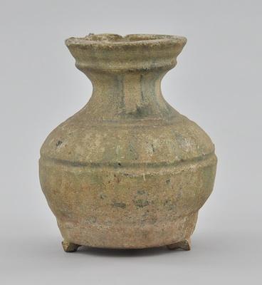 Appraisal: An Archaic Pottery Vase Earthenware with iridescent glaze bulbous form