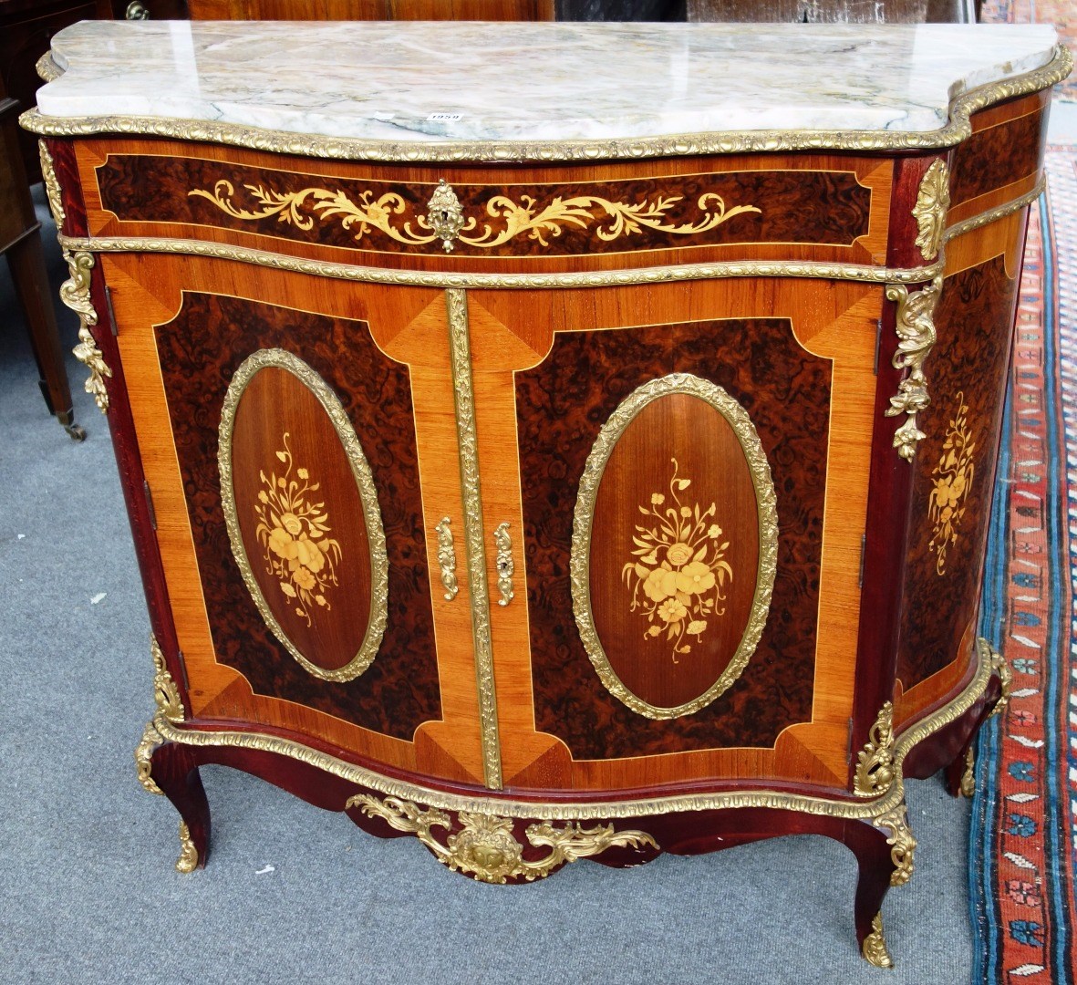 Appraisal: An th century style marquetry inlaid gilt metal mounted kingwood