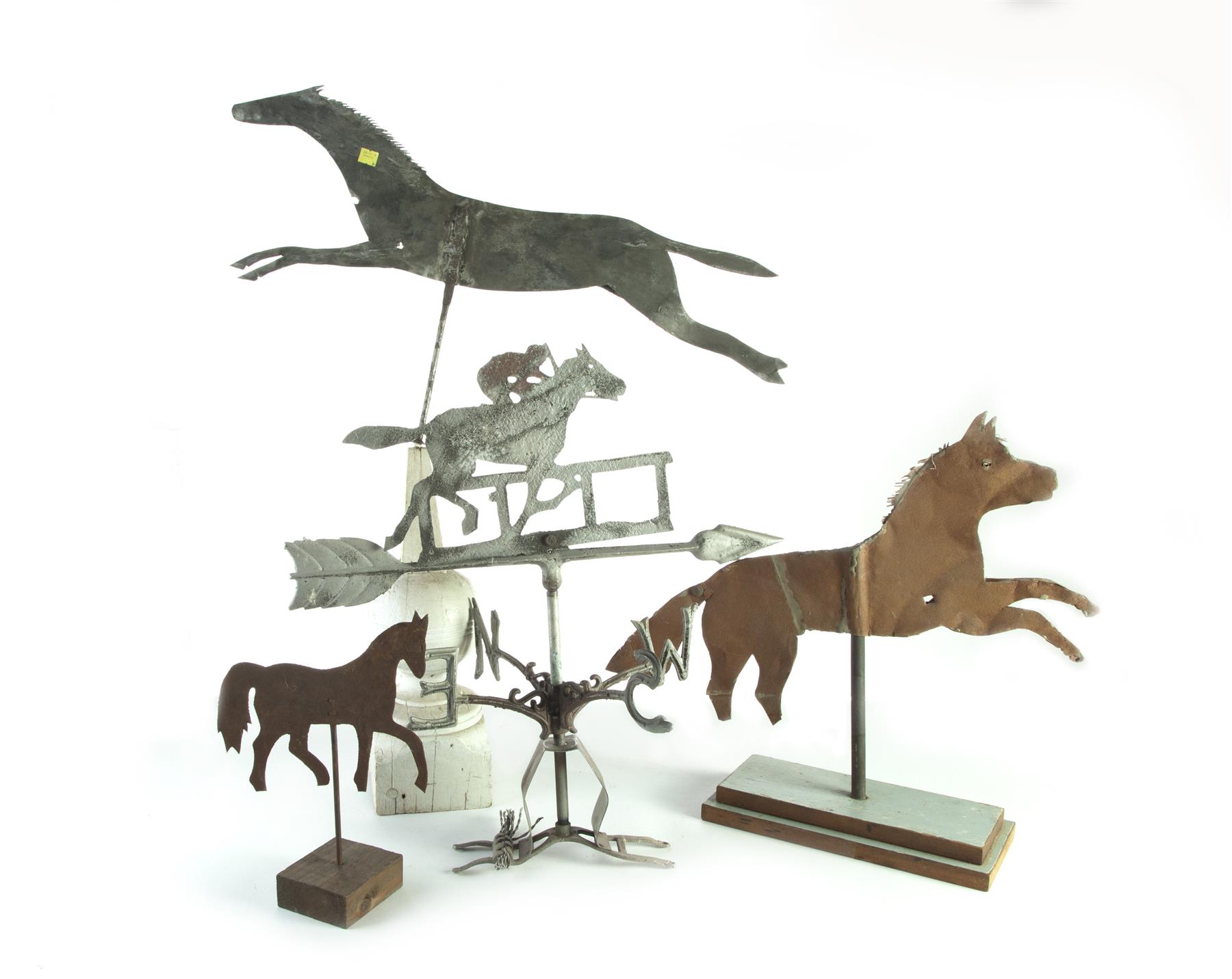 Appraisal: FOUR HORSE WEATHERVANES ON STANDS American th century Cast aluminum