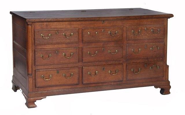 Appraisal: AN EARLY TH CENTURY LANCASHIRE OAK CHEST with hinged rising